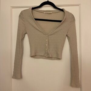Small, cropped cream lightweight cardigan